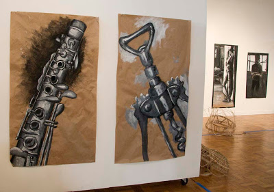 From left, drawings by Katy Short-Hamiwka and Gabrielle Wilde. (Photo by Katie Deits)
