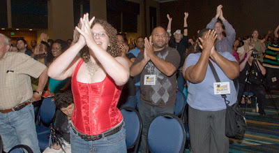Audience members at the Palm Beach County Convention Center on Saturday show their appreciation. (Photo by Katie Deits)