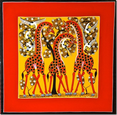 Three Giraffes, a painting by a Zanzibar artist, will be on sale at the Cookout for Kenya event in Jupiter.