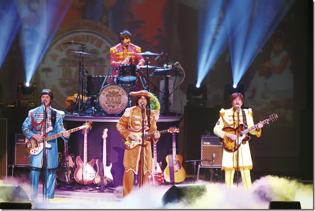 The members of Rain, in full Sgt. Pepper regalia.