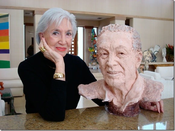 Muriel Kaplan with her bust of Donald Schlenger (2003), former chairman of auto parts giant R&S Strauss. 