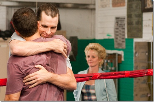 Mark Wahlberg (back to camera), Christian Bale and Melissa Leo in The Fighter.