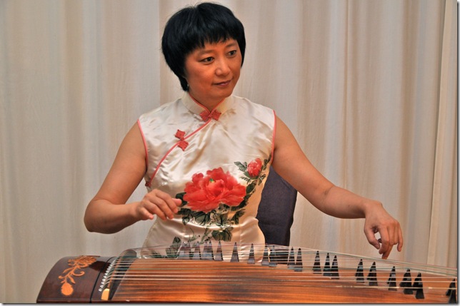 Ann Yao, a player of the traditional Chinese zheng, will perform during the upcoming Moon Festival at the Norton Museum of Art.