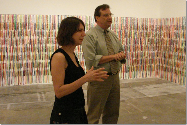 Artist Rivane Neuenschwander and senior curator Peter Boswell stand in front of Eu Desejo o Seu Desejo/I Wish Your Wish (2003). (Photo by Jenifer Mangione Vogt)