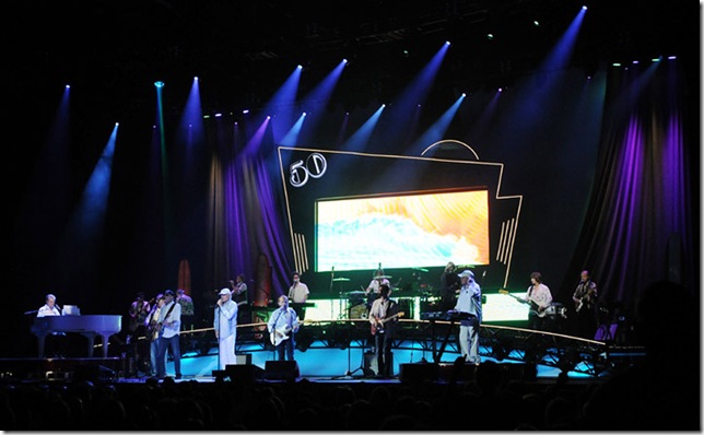 The full Beach Boys touring band, with Brian Wilson (left) on piano and Mike D'Amico of Lake Worth on bass (second from right). (Photo by Tom Craig)