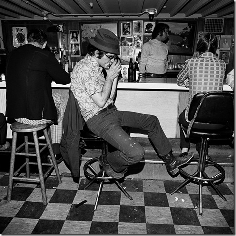 Harmonica Player, Merchant’s Café, Nashville, Tennessee (1974), by Henry Horenstein.