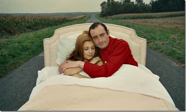 Nicole Calfan and Pierre Étaix in Le Grand Amour (1969).
