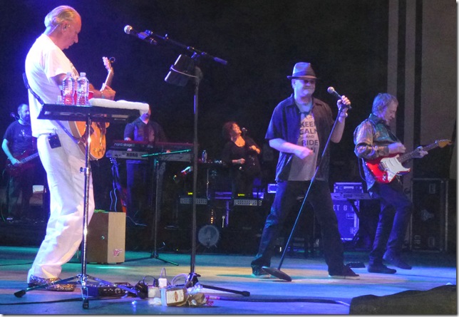 From left: Monkees Michael Nesmith, Micky Dolenz and Peter Tork perform Saturday at the Mizner Park Amphitheater in Boca Raton. (Photo by Dale King)