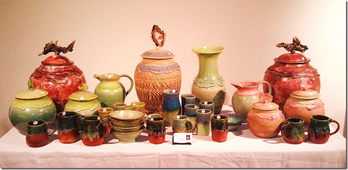 A table full of works by the artists of Cloud House Pottery in Delray Beach.