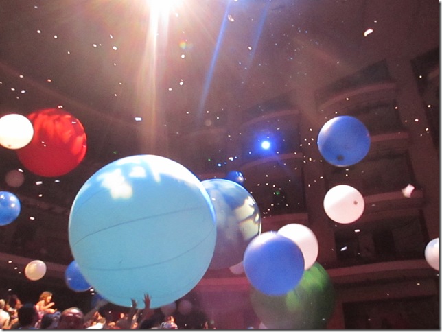 Giant balloons are part of the action at Slava’s SnowShow.
