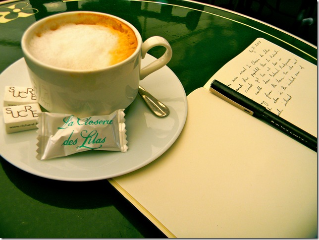 At La Closerie, with café crème and notebook. (Photo by Chloe Elder)