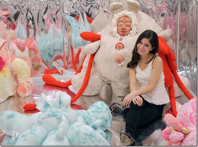 Amanda Madrigal amid her creatures in an earlier version of her 2013 installation, Las Muñecas (The Dolls) (Photo by Suzanne Dirks).