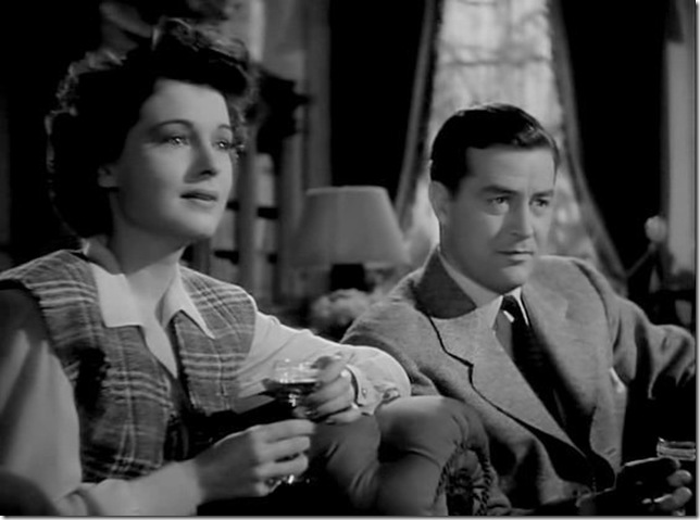 Ruth Hussey and Ray Milland in The Uninvited (1944). 