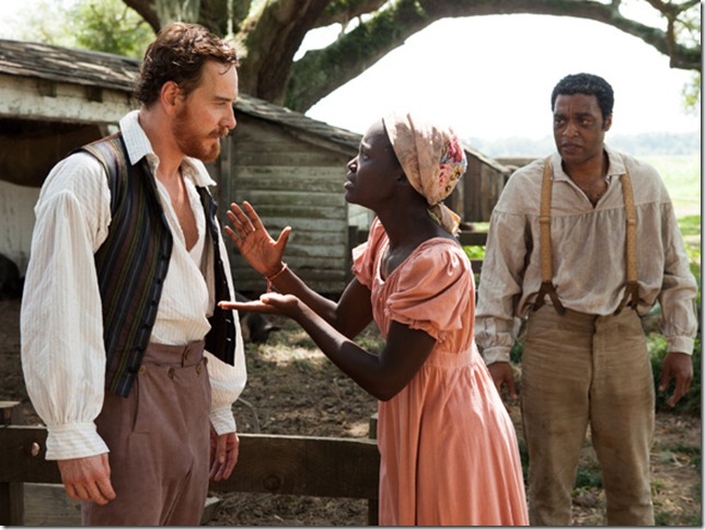 Michael Fassbender, Lupita Nyong’o and Chiwetel Eijofor in 12 Years a Slave.