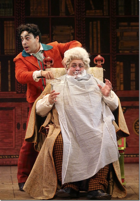 Rodion Pogossov as Figaro and Bruno Pratico as Dr. Bartolo, in Rossini’s Il Barbiere di Siviglia.