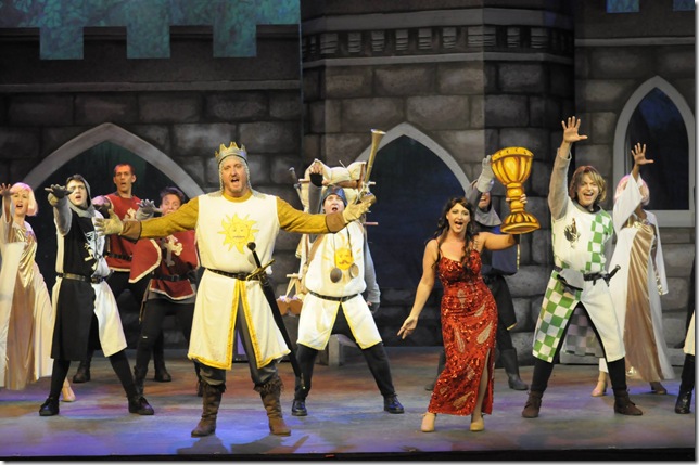 The cast of “Monty Python’s Spamalot” at Lake Worth Playhouse celebrates the recovery of the Holy Grail.