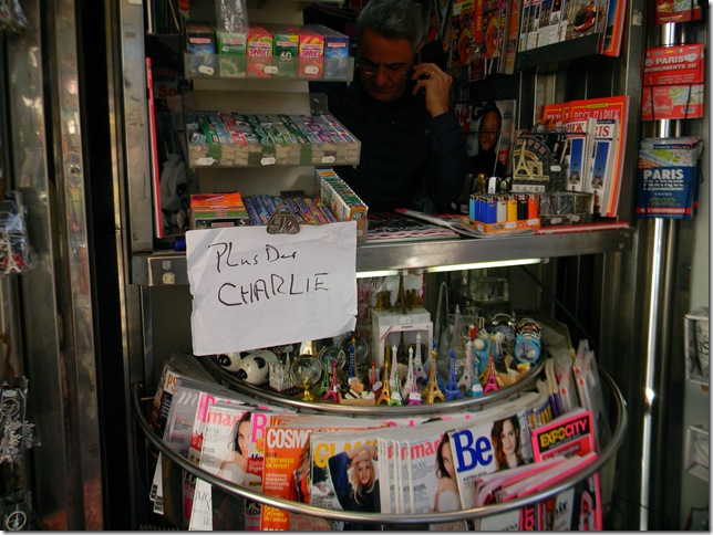 A news kiosk on the Rue de Rivoli displays a sign announcing they are out of Charlie Hebdo magazines. (Photo by Chloe Elder)