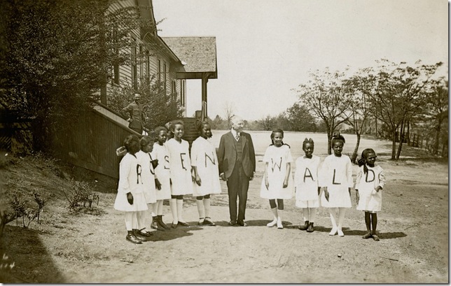 Julius Rosenwald with students from one of his Rosenwald schools in the South. (Photo from Fisk University, John Hope and Aurelia Franklin Library Special Collections)