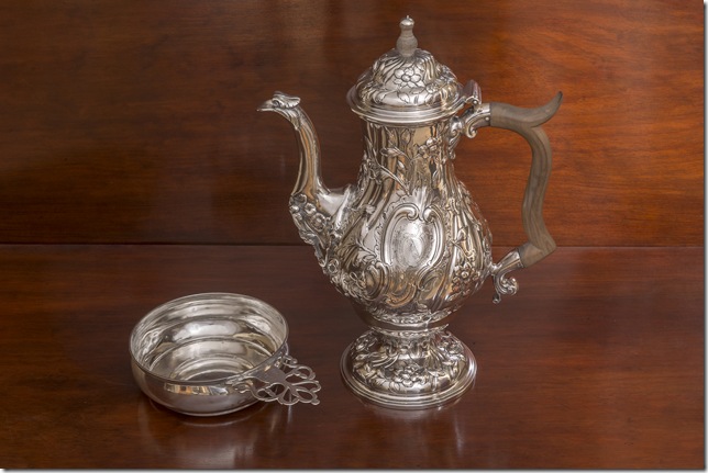 A porringer (left), c. 1765, by Thomas You, and a coffeepot, c. 1761, by Thomas Whipham and Charles Wright.