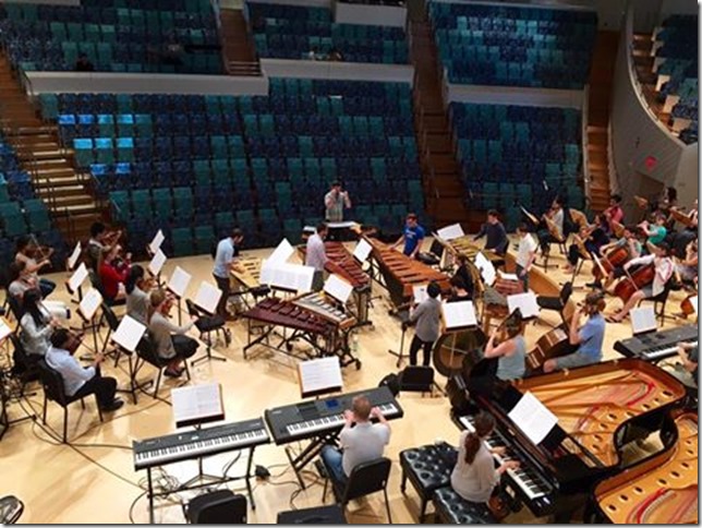 Patrick Dupre Quigley rehearses the New World Symphony and Seraphic Fire in Steve Reich's The Desert Music. (from Facebook)