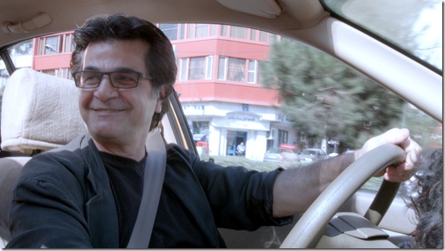 Jafar Panahi in Taxi (2015).